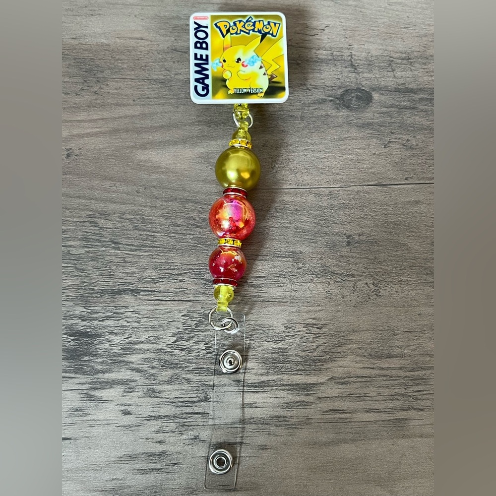 Pokémon badge reel